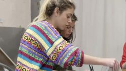 Instructor and student making pottery in workshop Stock Footage