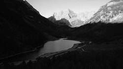 Amazing Sunrise at Maroon Bells , Colorado Aerial drone view forward slow high above Valley Stock Footage