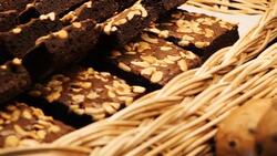 Showcase of cakes, breads, pastry in window display canteen for tasty desert food Stock Footage