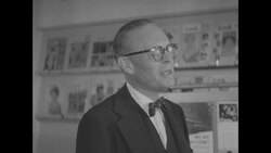 Actor George Murphy visits the office of Look magazine editor and publisher Gardner Cowles as he is working on special Hollywood edition News Clip