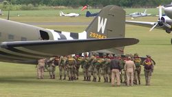 Parachutists boarding Douglas Dakota aircrafts at Imperial War Museum Duxford News Clip