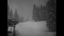 California, 1952: As a train attempts to navigate through snow, a history of Donner Pass is narrated Stock Footage