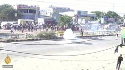 Thousands of farmers march to Indian capital defying tear gas News Clip