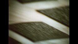 UNITED STATES 1960s: Man looks through plastic film. Stock Footage