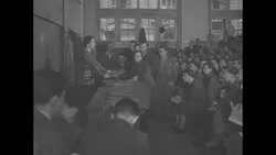 Pres. Truman signs copy of book "Mr. President as part of Books for Freedom" campaign sending books to Berlin to replace books burned by Nazis News Clip