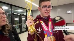 A champion’s welcome home for Labrador athlete Colin Rumbolt News Clip