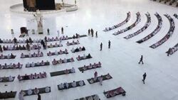 CLEAN : A small number of worshippers attend Eid prayers in Mecca holy city News Clip