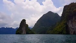 Moving follow boat with Beautiful mountains lake river sky and natural attractions in Ratchaprapha Dam at Khao Sok National Park, Surat Thani Province, Thailand. Stock Footage