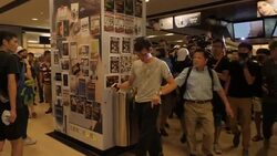 Violent scenes as protesters attack man in Hong Kong shopping mall News Clip