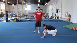 How to Do a Forward Straddle Roll Instructional Video