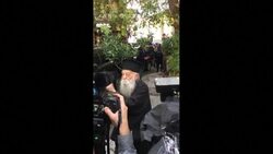 CLEAN : Orthodox priest denouncing Pope Francis' reception by the Greek church is removed by police News Clip