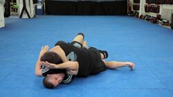 How to Do Arm Triangle Choke from Bottom Half Guard Position Instructional Video
