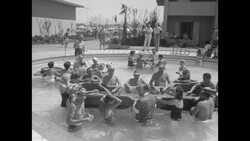 People playing craps in Las Vegas Sands Hotel swimming pool in the 1950s News Clip