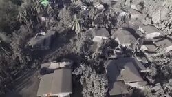 CLEAN : Taal volcano covers houses and streets in ash News Clip