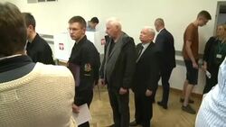 CLEAN : Jaroslaw Kaczynski casts his vote in Poland's parliamentary election News Clip