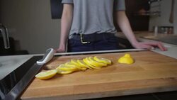 Young woman preparing lemonade Stock Footage