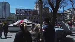 VOICED : Las calles el ultimo refugio de los más golpeados por la crisis argentina News Clip