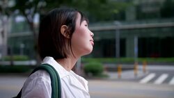 Women requesting taxi from a smart phone Stock Footage