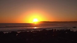 Practicing yoga at the sunset in slow motion 250fps Stock Footage