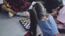 Elementary age school Playing with chess Stock Footage