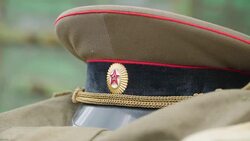 The brown hat of the russian soldier on top of the uniform Stock Footage
