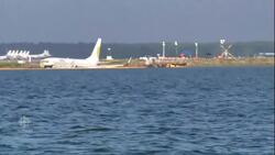 Boeing 737 slides off runway News Clip