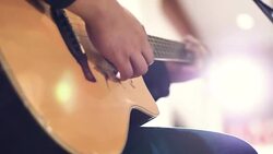 Acoustic guitar in musician hands at party. Stock Footage