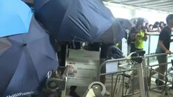 CLEAN : Hong Kong protesters gather near airport bus terminus News Clip