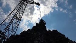 Scrap metal recycling plant and crane Stock Footage