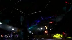 Colorful spinning wheel in amusement park at night Stock Footage