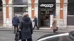 Queue outside supermarket in Rome during coronavirus lockdown News Clip