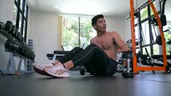Young Asian handsome man doing exercises in gym Stock Footage
