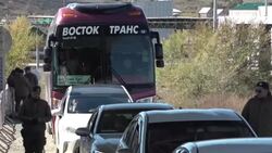 CLEAN : Queues build up at Mongolian border as people flee Russia call-up News Clip