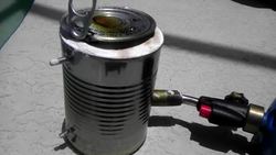 Small soup can forge melting zinc. Instructional Video