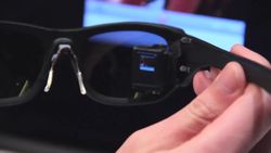 Innovega's wearable electronics allows users to see objects up close - CES 2014 Instructional Video