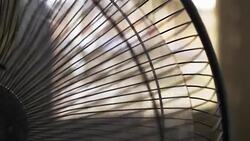 back side electric fan propeller spinning to stop close up Stock Footage