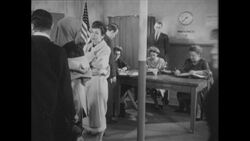 1960s: Polling place busy with people Stock Footage
