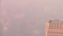 Stifling smog blankets Beijing skies News Clip