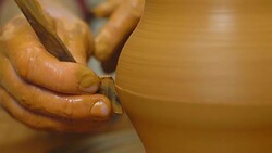 Potter works with clay Stock Footage