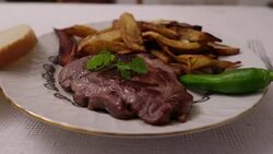 Steak and french fries in a plate - Stock Video Stock Footage