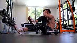 Young Asian handsome man doing exercises in gym Stock Footage