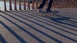 man skateboarder legs skateboarding at sunrise city Stock Footage