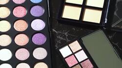 4k top view and turning of make-up palette. Stock Footage