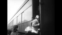 California, 1952: Nurses and relief workers board a train in Colfax, California to aid people in a blizzard Stock Footage