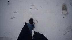 Vintage footage man walks on snow and sand - Stock Video Stock Footage