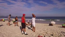 CLEAN : With megaphones, Brazil orders Rio beach-goers home News Clip