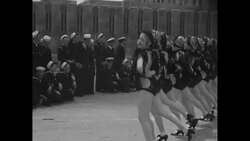 Rockettes perform dance routine on roof of Radio City Music Hall in NY City for US Navy sailors and officers News Clip