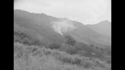 Soldiers fighting for hill probably around the 38th parallel during the Korean War News Clip