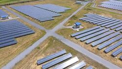 Aerial View of Solar Farm with Sunlight, Renewable Energy, Solar Energy Stock Footage