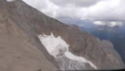 CLEAN : Images of the Marmolada glacier from a helicopter, as rescue operations continue News Clip